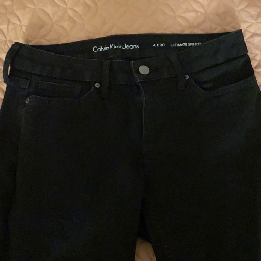 Black Calvin Klein jeans,  skinny jeans size 4×30